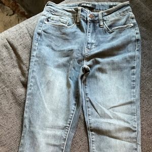 Judy Blue NWOT size 3/26 med-light wash jeans with “shark bite” fringe ankle/hem